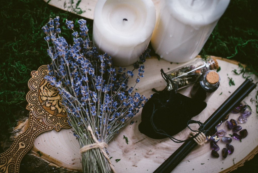 White Pillar Candle Beside White Pillar Candle